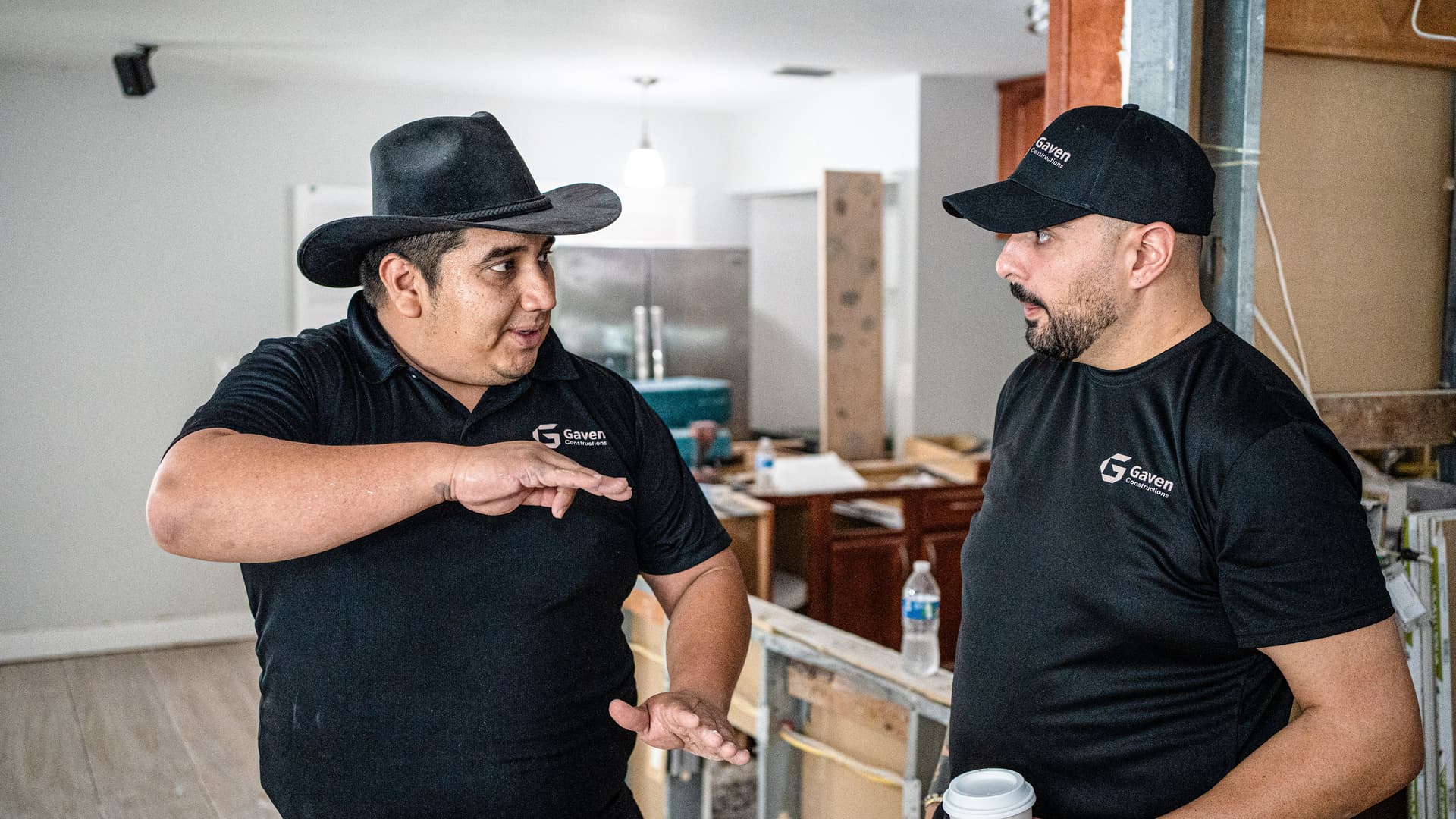 Gaven Constructions team manager reviewing Miami condo project