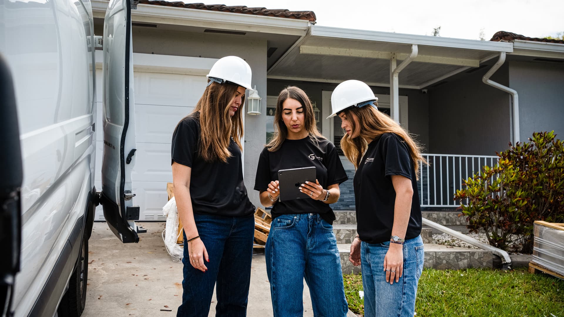 Gaven Constructions team on a Miami-Dade residential jobsite — paired establishing shot with the hero crew photo