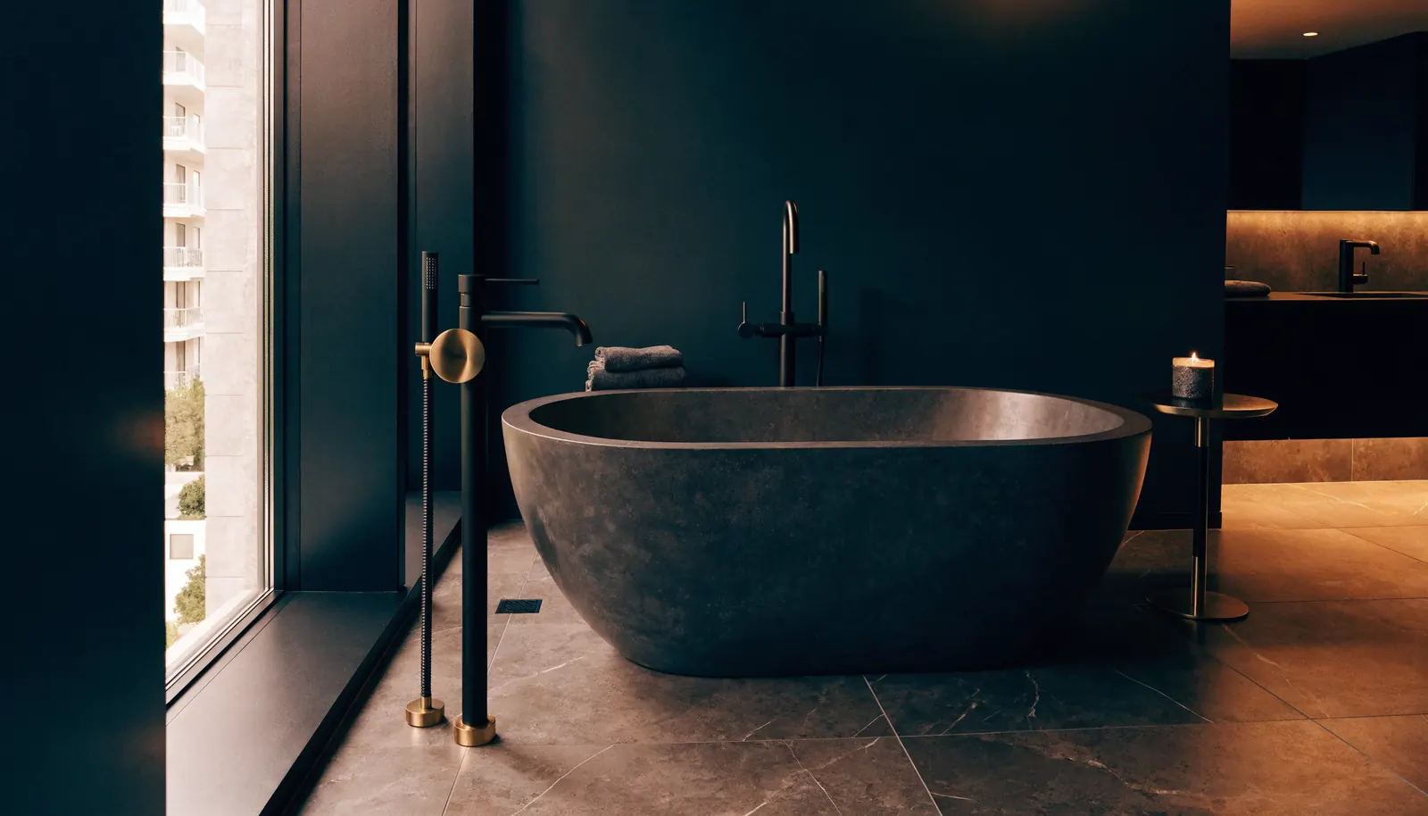 Freestanding soaking tub installed in a completed high-end Miami bathroom remodel