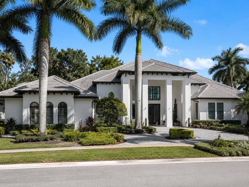 Boca West country club community single-family home with mature landscape, Palm Beach County