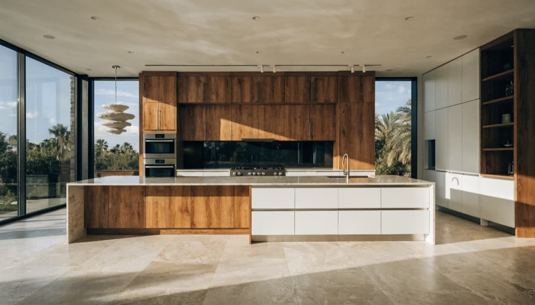 Completed luxury modern kitchen with a waterfall island