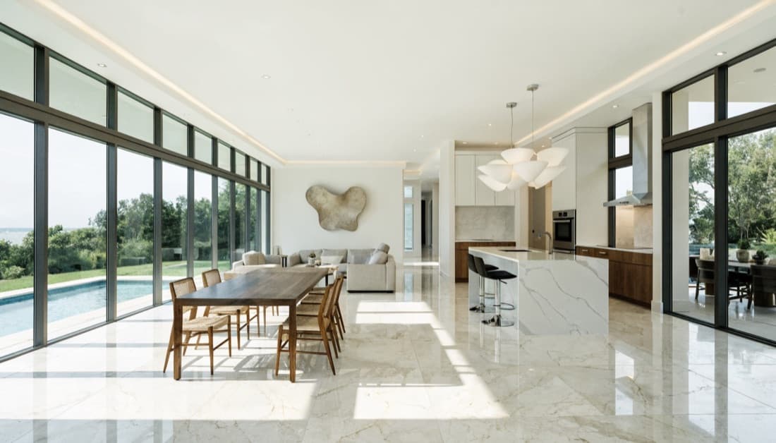 Gut-renovated open-concept great room with kitchen flowing into the living area