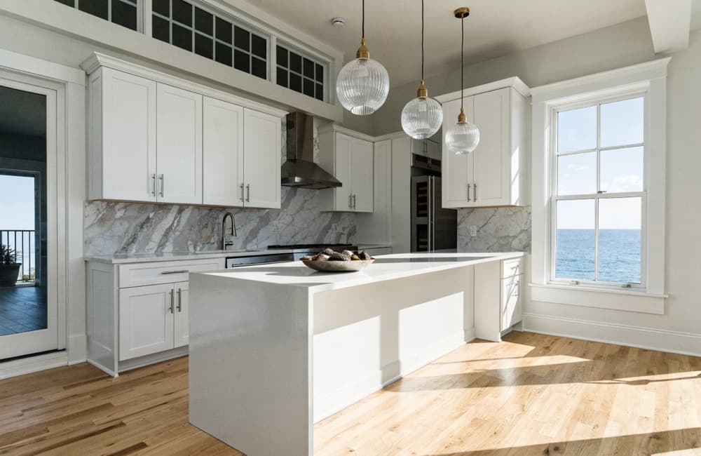 What happens without a notice of commencement in Miami: a finished kitchen with installed cabinetry, stone counters and under-cabinet lighting.