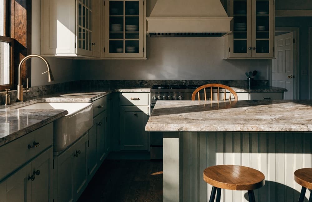 Full kitchen remodel with cabinetry and counters installed, the scope a condominium association reviews before work begins
